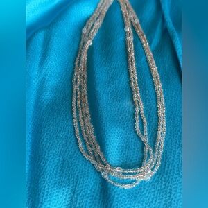 Four strand clear beaded necklace